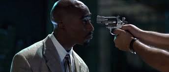 The One In Front Of The Gun Lives Forever Tattoo Pin By Ebonecoffee On Movies Tv Shows Tupac Shakur Me Against The World Tupac