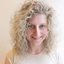 Embrace your curls! This curly hair cut by Paige at Hedkandi Salon 8 Street