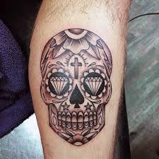 The sugar skull tattoos are complex in design, generally, have floral elements, and contain several colors. Mexican Sugar Skull Tattoo For Guys On Inner Forearm Mexican Skull Tattoos Candy Skull Tattoo Sugar Skull Tattoos