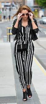 Black And White Striped Jumpsuit With Jacket Catherine Tyldesley Flaunts Her Svelte Figure In Chic Pencil Dress White Jumpsuit Outfit Chic Pencil Dress Black White Jumpsuit