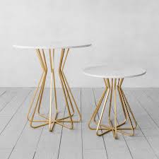 The christie round marble end table contrasts a polished white marble top with a sculptural black iron base for a look that's both classic and new. Maude White Marble Side Tables Graham Green