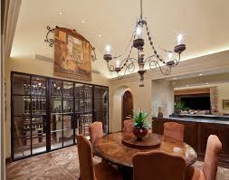 Example of a tuscan dark wood floor dining room design in dallas with white walls, a standard fireplace and a plaster fireplace 20 Outstanding Tuscan Dining Room Decors Home Design Lover