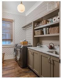 A simple rearrangement of task areas takes advantage of vertical space. Laundry Inspiration Create Home Storage Room Tiles Design Laundry Room Design Laundry Room Inspiration