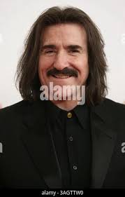 President of The Latin Recording Academy Luis Cobos and Patricia Cobos  arrive for the Latin Recording Academy Person of the Year Tribute to  Caetano Veloso at the MGM Grand Garden Arena in