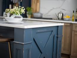 Using reclaimed wood in a cool grey hue matches with the clean white modern look this kitchen is going for. Modern Farmhouse Kitchen Island With Rustic Blue Heritage Paint Finish Farmhouse Kitchen Newark By Dura Supreme Cabinetry Houzz