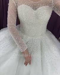 Find the perfect ball gown wedding dress photos and be inspired for your wedding. Illusion Long Sleeves Pearls Wedding Dress Ball Gown 2020 Loveangeldress