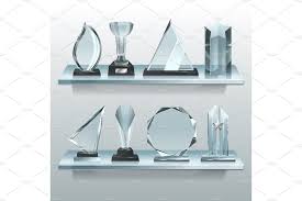 Collections Of Transparent Trophies Awards And Winner Cups On Shelf Of Glass Trophies Awards Trophy Trophies Awards