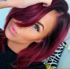 Here, you can see how light, feathery bangs also pair well with the dark swoops of burgundy babylights make this dark brown hair color look both moody and delectable. 20 Burgundy Hair Colors And Styles