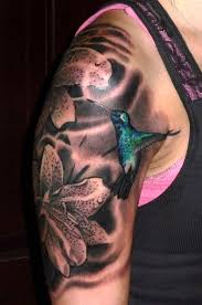 Black And Grey Flower Tattoos With Color Tattoo C 2012 Kore Flatmo Plurabella Hummingbird Lilies Flowers Floral Color Black And Gray Tattoo T Black And Grey Tattoos Thigh Tattoos Women Tattoos