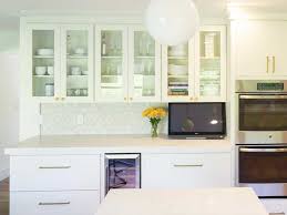Modern White Glass Slab Door Cabinets With Gold Hardware White Kitchen Remodeling Slab Door Kitchen White Modern Kitchen