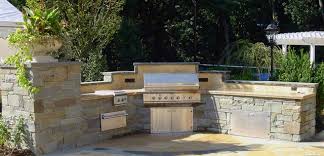 Create a barbecue area on the top level, and enjoy some social time on the bottom. Custom Outdoor Bar Bbq Grill Design Installation Bergen County Nj Traditional Patio New York By Cipriano Landscape Design Custom Swimming Pools Houzz Uk