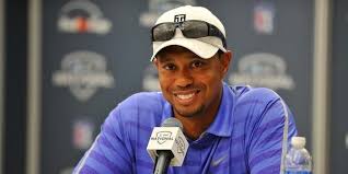 Tiger Woods Wearing A Blue Shirt White Hat And Sunglasses For An Interview Wood Sunglasses Cheap Ray Bans Watches For Men