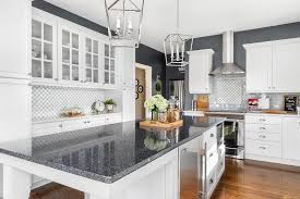 Sand the surface with a fine grit sandpaper such as #400 grit in order to create a good surface for the paint to adhere to. What S The Best Kitchen Countertop Material Corian Quartz Or Granite