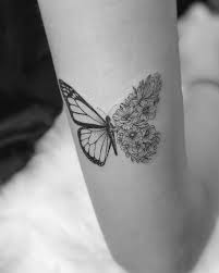 Butterfly tattoo designs are one of the most popular choices of tattoo for women. Flower Butterfly Tattoo On The Back Of The Right Arm