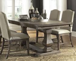 Visit our website to shop now! Johnelle Dining Room Extension Table Gray In 2020 Grey Dining Tables Grey Dining Room Dinning Room Tables