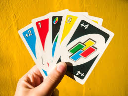 If the center row has a red 7 and you have a red 5 and a wild dos™ card in your hand, you could play the combination of the red 5 and the wild dos™ card on the red 7, and designate the wild dos. Dos Mattel S Uno Card Game Sequel Is Bad Here S Why