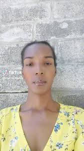 Back To Basic In Parts of Grenada. Sammy Charles of the Big Parish Grenada,  making the best of the situation after her home has been left without  running water following the passing