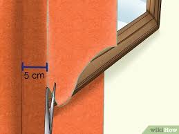 Wallpapering can seem like a difficult task (image: How To Wallpaper Corners And Around Trim 11 Steps With Pictures