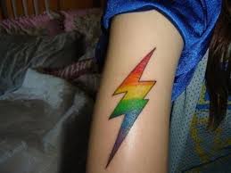 Youthful and fun, this tattoo has a happy, joyous vibe. 45 Rainbow Tattoos For The Colourful You