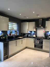 Maybe you would like to learn more about one of these? Battleship Dark Grey Kitchen Cream Gloss Cupboards Granite Worktop Kitchen Design Kitchen Remodel White Kitchen Cupboards