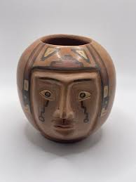 Where does this mystery head effigy pottery hail from?