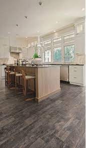 Next, rinse the area thoroughly and use a cloth to wipe the surfaces clean. Laying Wood Look Tile Everywhere Grout Or No Grout