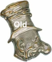 This match safe has a repousse art nouveau design consisting of a foliage or foliate design over a ribbed background. Figural Match Safes Reproduced