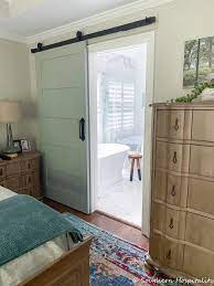 Something like this is also perfect for creating a concealed effect. Adding A Sliding Barn Door To Our Master Bath Southern Hospitality