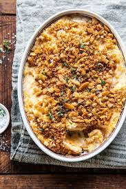 Cheesy Potato Casserole With Buttery Ritz Crackers Half Baked Harvest Recipe Half Baked Harvest Recipes Potato Casserole Harvest Recipes
