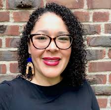 PHOTO: Milmaglyn smiling towards the camera.] The National Association of  the Deaf (NAD) is pleased to announce the addition of Milmaglyn Morales to  our Board of Directors! In April 2020, Liz Hill