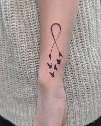 Top 41 Best Infinity Tattoos 2021 Inspiration Guide Infinity Tattoo Designs Infinity Tattoos Infinity Sign Tattoo
