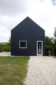Schwarzes haus satteldach moderne architektur holzhaus villen einfamilienhaus renovieren haus bauen wohnen. Schwarzes Haus Am Hang Homify Schwarzes Haus Haus Am Hang Architektur