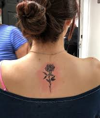 Rose Backbone Tattoo In 2020 Back Tattoo Rose Neck Tattoo Small Rose Tattoo