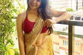 Indian designer wear beautiful saree. Sakshi Agarwal Hot In Half Saree Navel Show Photoshoot Stills Sareeglitz