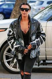 Kim Kardashian Jacket With Her Face On It For Movie Night With Kanye Kim Kardashian Kim Kardashian Kylie Jenner Kim Kardashian Braids