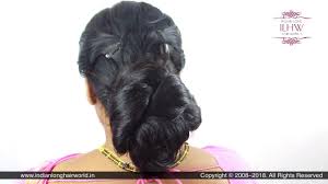 Another classic indian bridal look, this gorgeous hairstyle is a very stylish way of wearing your hair for the wedding, featuring long, loosely curled locks to the side that add an element of messy that complements the perfectly styled parting up top and the immaculate bun. Asmr Low Bun How To Make Low South Indian Style Hair Bun Diy Low Hair Bun Tutorial For Beginners Youtube