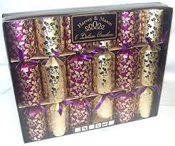 We offer a large assortment of luxury british christmas party crackers in all type of themes for the holiday entertaining. 6 Large Deluxe Christmas Dinner Party Crackers Gold Amp Purple Holly Design Buy Online In Bosnia And Herzegovina At Bosnia Desertcart Com Productid 48385074