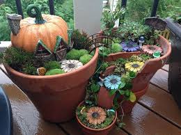 Unglazed terracotta pots are ideal when designing fairy gardens. Fairy Gardens Made From Broken Planter Design Swan