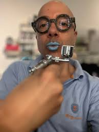 Custom Harley reassembly completed, rider smiling