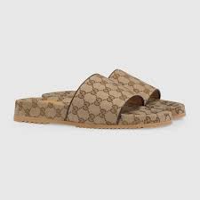 Huge collection sale prices buy online now. Gucci Men S Gg Canvas Slide Sandal
