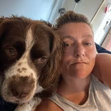 Hi all! I just wanted to introduce myself and share a photo that I took of  me and my best buddy Ben . Who rescued who is not clear but I would