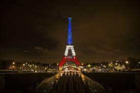 Eiffel tower was built as the centerpiece of and the entrance to the 1889 exposition of paris, a world's fair to celebrate the centennial of the french revolution. Photos Eiffel Tower In The French Flag S Colors Chicago Tribune