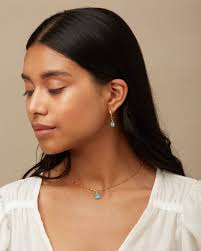 Her 14k gold hoop earrings clearance