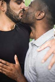 Two Men Kissing · Free Stock Photo