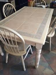 The size of this couple dining table is: Kitchen Table With 4 Chairs Solid Wood With Inlaid Tile Top For Sale In Fort Myers Fl Offerup