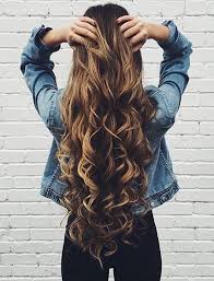 Wondering how to make bangs work on curls? 25 Curly Hairstyles For Long Hair
