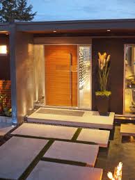 This modern front door idea allows more light into the entryway and saves you money on having to purchase a larger or double front door. How Modern Front Doors Can Reveal The Character Of Your Home