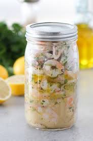 Once the broiler is preheated, place the shrimp skewers on a sheet pan coated with cooking spray or lined with parchment paper. Marinated Shrimp Appetizer Olga S Flavor Factory