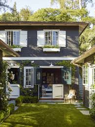 This modest cottage, built c. Black Houses The Pros And Cons Of A Dark Painted Facade Gardenista