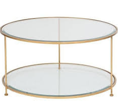 Stunning gold leafed steel and glass cocktail table after maison baguès and giacometti. Rollo Round Gold Coffee Table